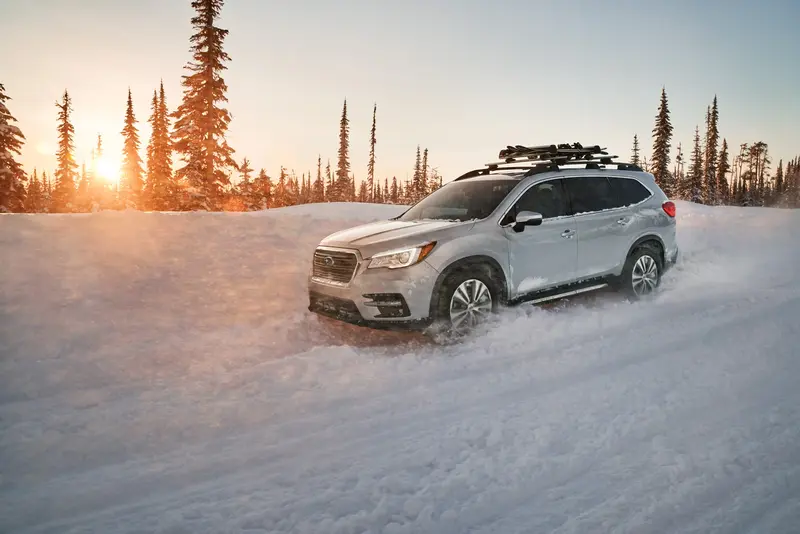 Subaru driving in snow