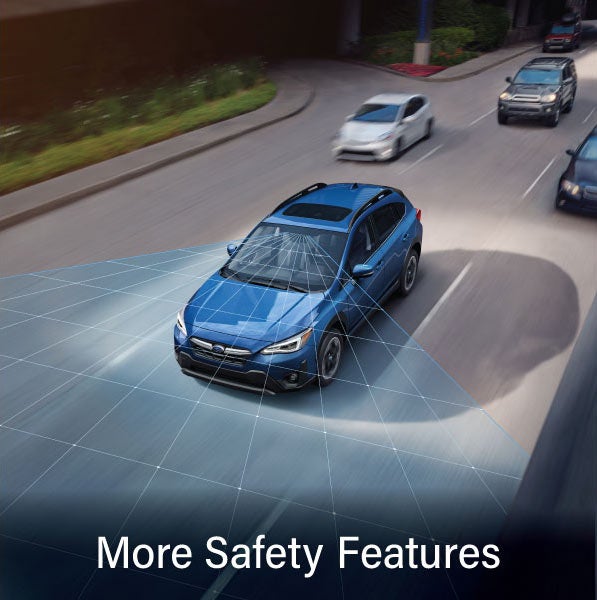A Subaru Crosstrek in blue with the words &ldquo;More Safety Features&ldquo;. | Hanania Subaru of Orange Park in Jacksonville FL