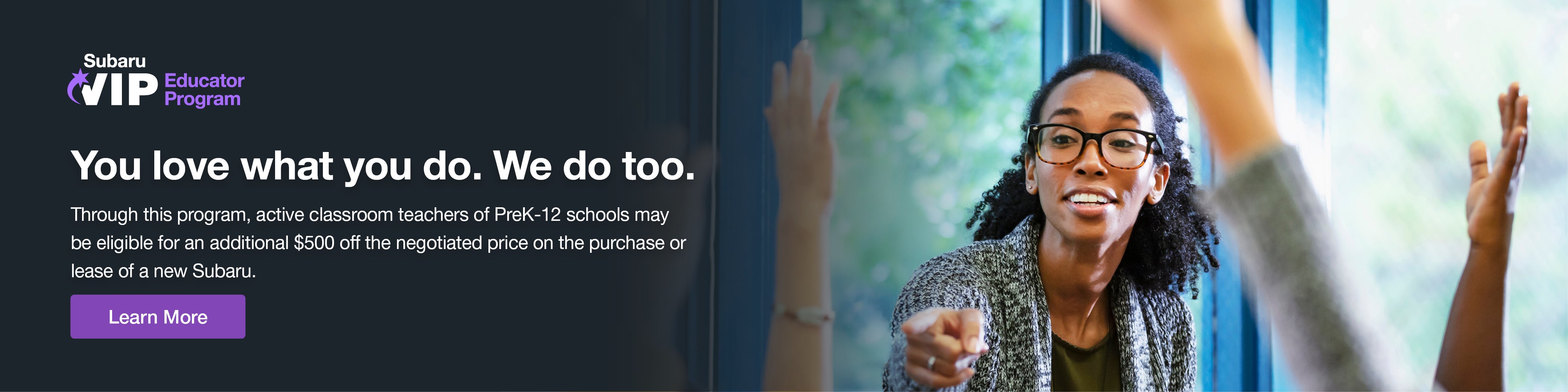 Educator standing in a classroom.