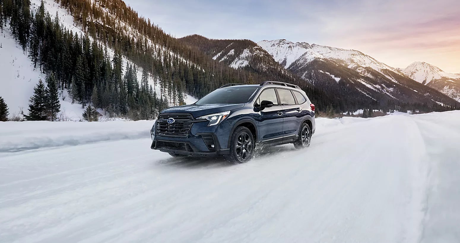 a subaru ascent parked at a soccer field