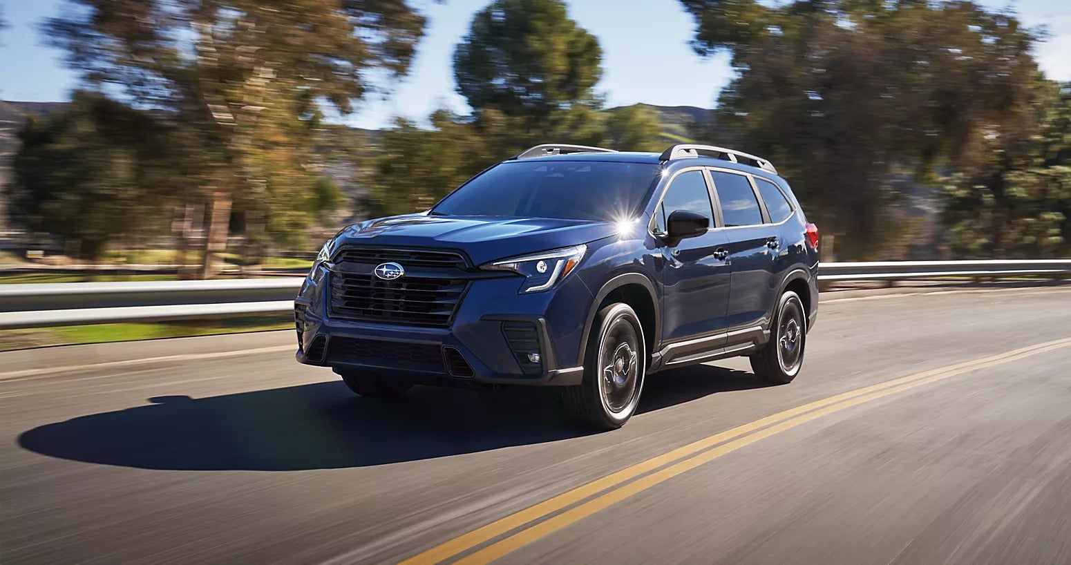a 2025 subaru ascent driving on a highway