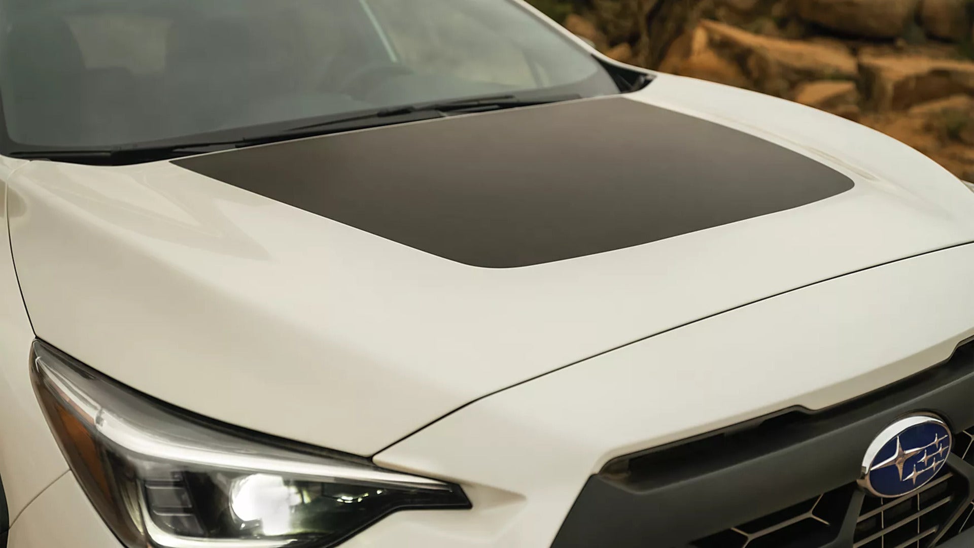 A close look at a white crosstrek.