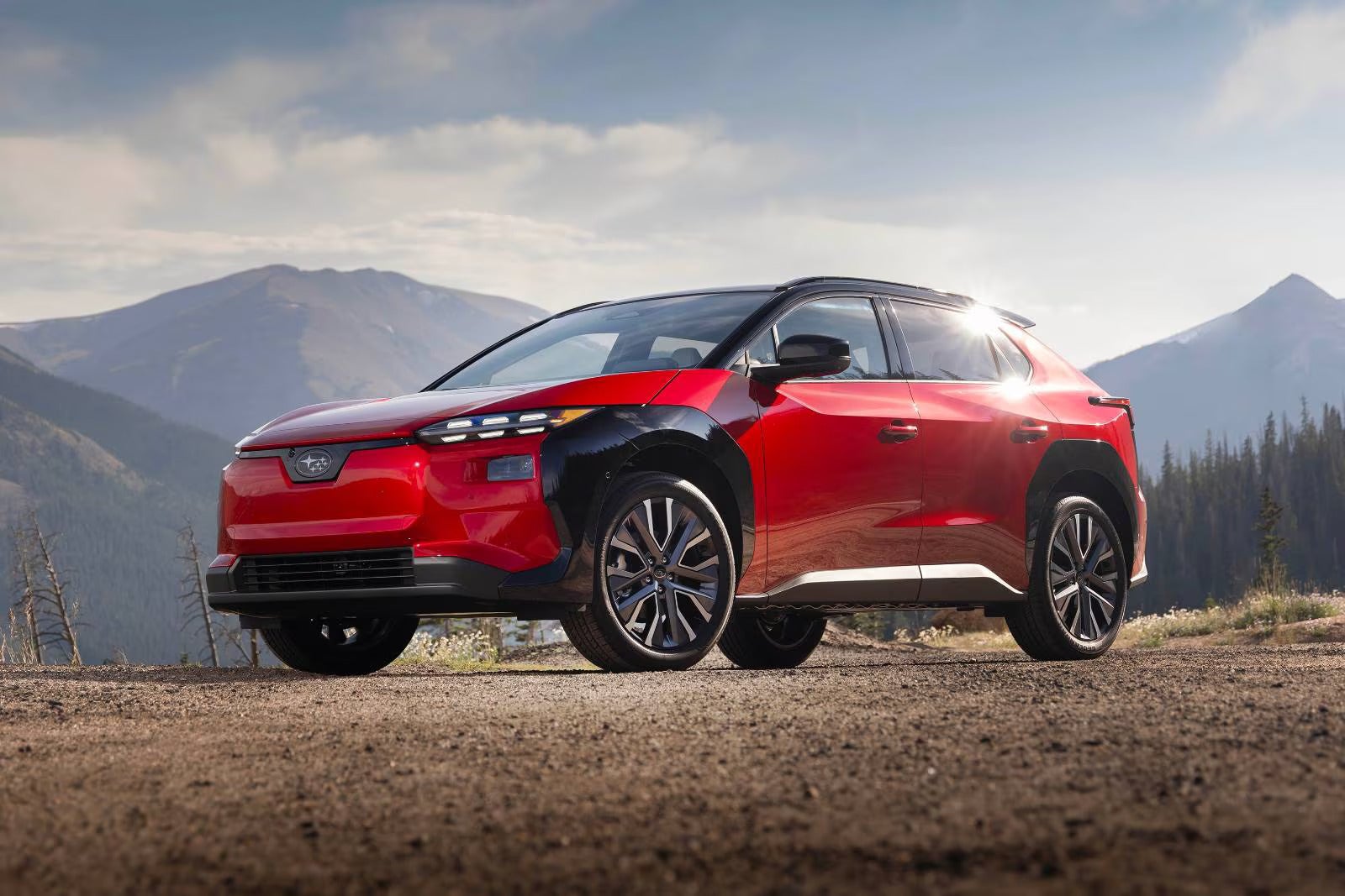 A red car sitting parked.