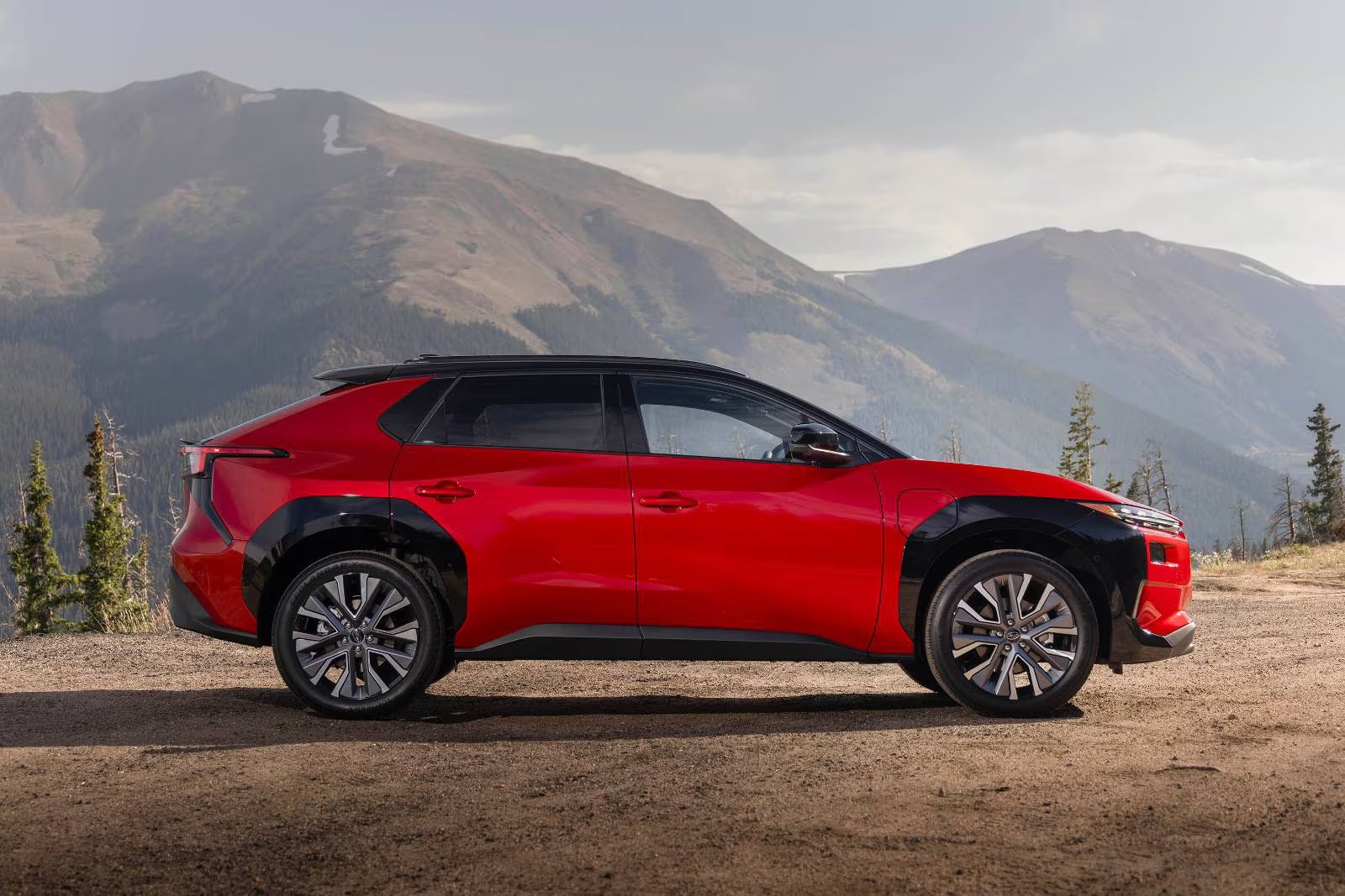 A red car sitting parked.